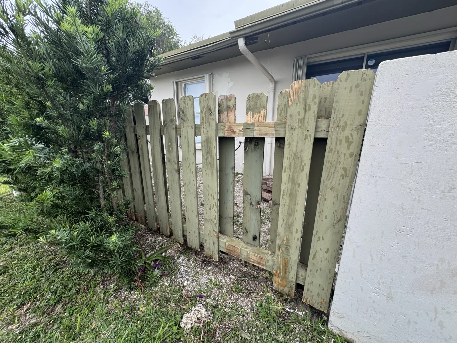 Wood Fence Repair and Painting, handyman services project photo 56