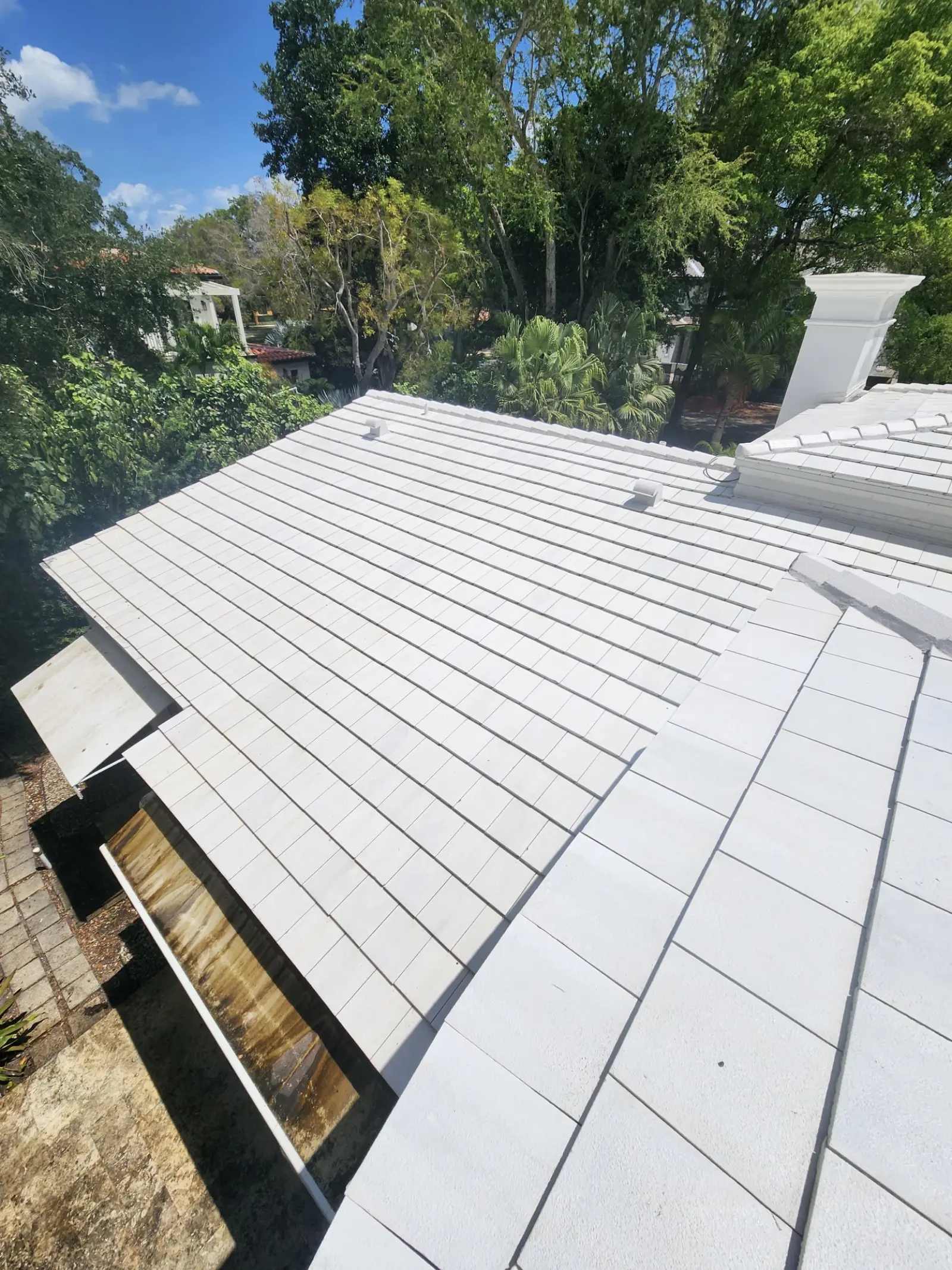 White Tile Roof Cleaning and Restoration, pressure washing project photo 4