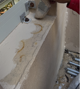 Surface preparation before residential waterproofing application